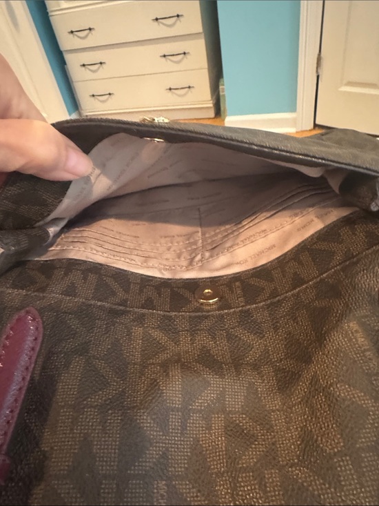 Michael Kors brown jet set medium travel bag with burgundy handles and trim
